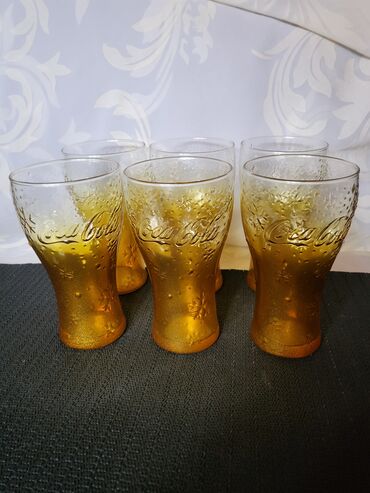 Čaše: Case nove Coca Cola. Case nove,dezen reljefni i stampa ( ne ostaje na — 9