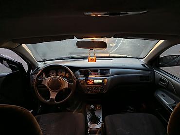 w202 qapı: Mitsubishi Lancer: 1.6 l | 2005 il 290000 km Sedan — 4