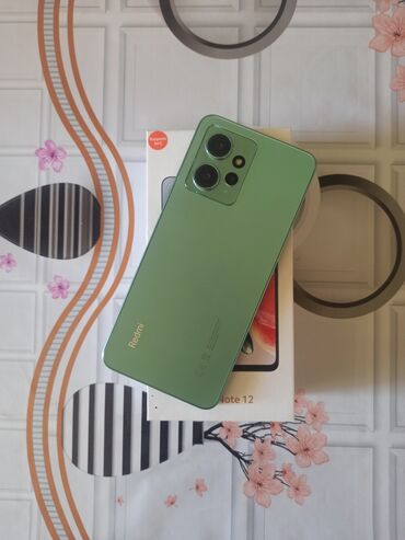 telefon alqı satqısı: Xiaomi Redmi Note 12, 128 ГБ, цвет - Зеленый, 
 Гарантия, Отпечаток пальца, Беспроводная зарядка