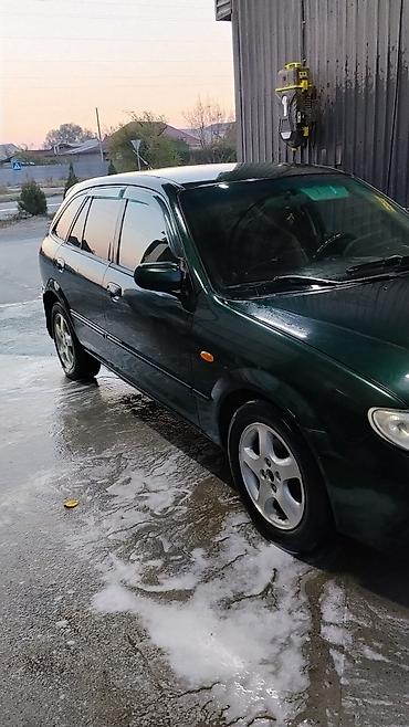 mini cooper: Mazda 323: 2001 г., 1.6 л, Механика, Бензин, Универсал — 4