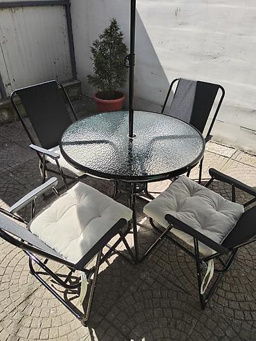 Stilske garniture: Baštenski set – sto, 4 stolice i suncobran - Okrugli sto sa — 5