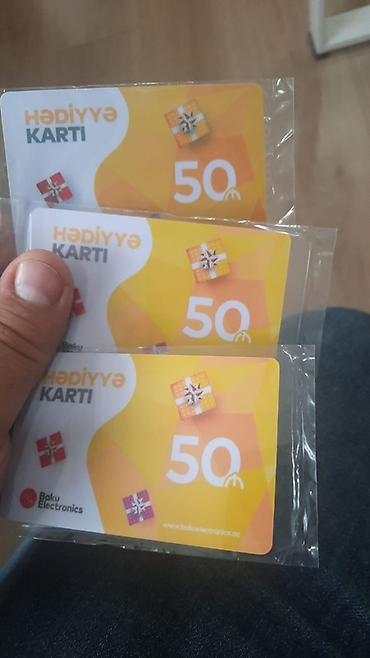 Baku Electronics hədiyyə kartı - Dəyər: 50₼ (şəkildə 3 ədəd kart