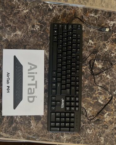 Klaviaturalar: Airtab P01 markalı qara rəngli klaviatura. Kompakt ölçüsü və USB