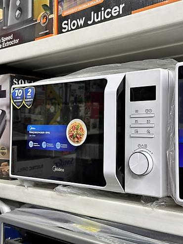 Микроволновая печь Midea, белая, с механическим управлением. Основные