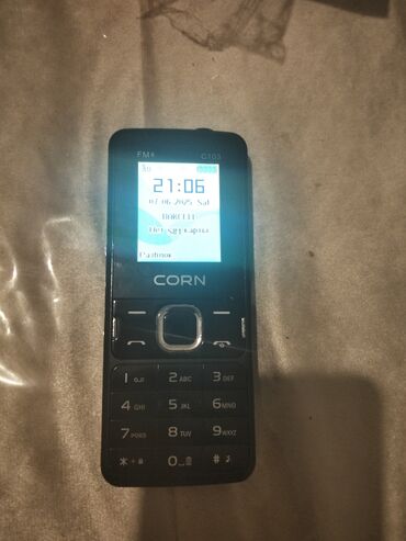 телефон fly sx210: CORN markalı, düyməli, qara rəngli mobil telefon. Yığcam dizaynı və