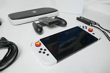 Nintendo Switch: U ponudi je Nintendo Switch OLED (čipovan). Memorija: 256 GB + 64 GB — 10