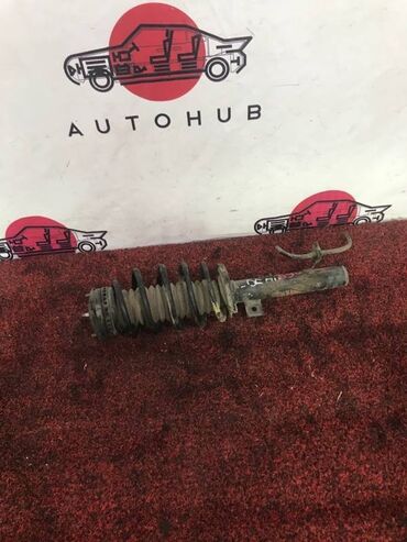 Другие автозапчасти: Амортизатор Mazda Demio DY3W ZJ 1.3 2003 перед. (б/у) ХОДОВАЯ ЧАСТЬ -