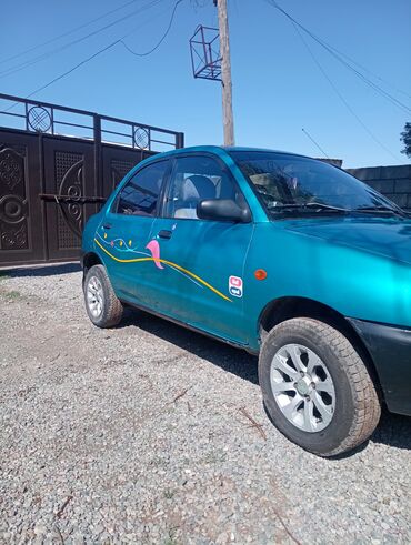 Mazda: Mazda 121: 1992 г., 1.3 л, Механика, Бензин, Хэтчбэк