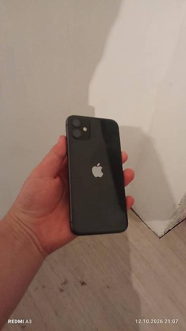 IPhone 11, черный цвет. Смартфон Apple в классическом корпусе с
