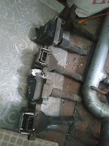 Катушки зажигания: Катушка зажигания Audi 1996 г., Оригинал, Германия — 3