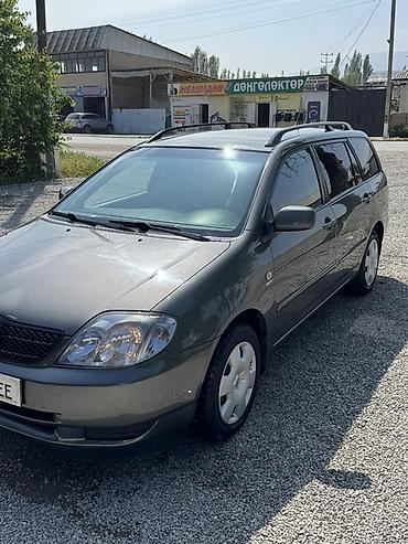 мотор морнинг: Toyota Corolla: 2003 г., 1.6 л, Механика, Бензин, Универсал — 5