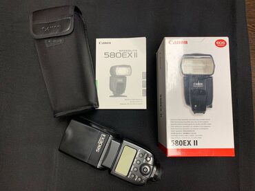 лампы для освещения: Canon Speedlite 580EX II Описание Мощная портативная вспышка Speedlite