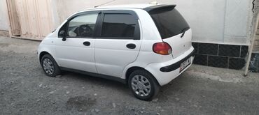 багажник для джипа: Белый городской хэтчбек Daewoo Matiz, идеальный для передвижения в