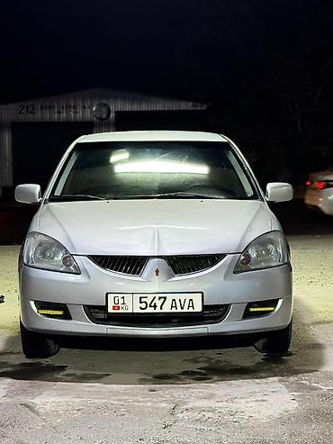 выхлопы: Mitsubishi Lancer: 2004 г., 1.6 л, Автомат, Бензин, Седан — 6