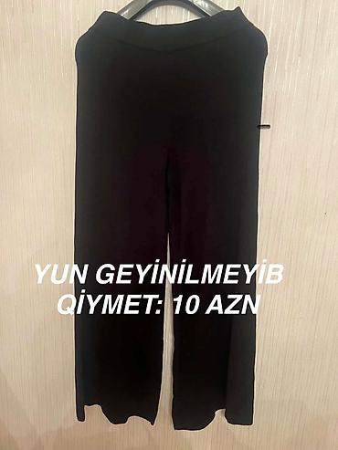 tornado 7000: === PART 1: TEXTUAL DESCRIPTION === Qara rəngdə, yun materialdan — 1