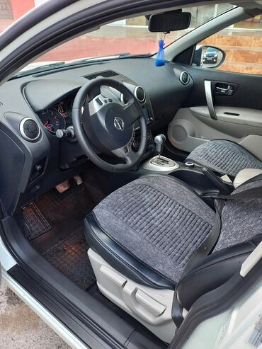 Nissan: Nissan Qashqai, ağ rəngli şəhər-krosoveri. Xüsusiyyətlər və detallı — 7