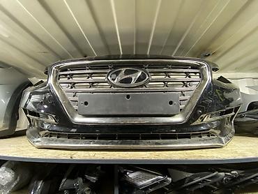Передний бампер в сборе для Hyundai (оригинальный). Комплектация по