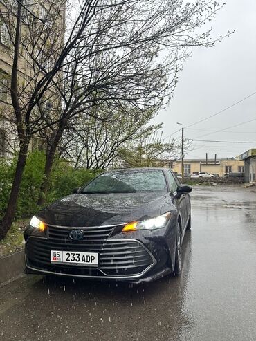 Toyota: Продается седан Toyota Avalon черного цвета. Этот автомобиль имеет