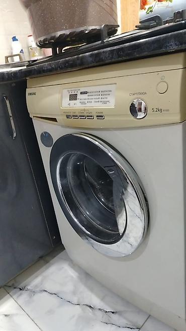 sulu vintilyator: Samsung önyükləməli paltaryuyan maşın - Model xətti: R1033 (etiketdə — 1