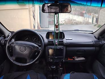 Скупка авто: Opel Corsa B, 5 qapı, tünd mavi rəng. Əsas xüsusiyyətlər: - Kuzov — 3