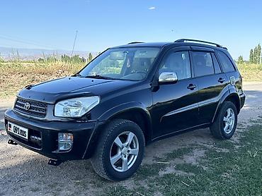 чехлы на хр: Toyota RAV4: 2003 г., 2 л, Автомат, Бензин, Кроссовер — 1