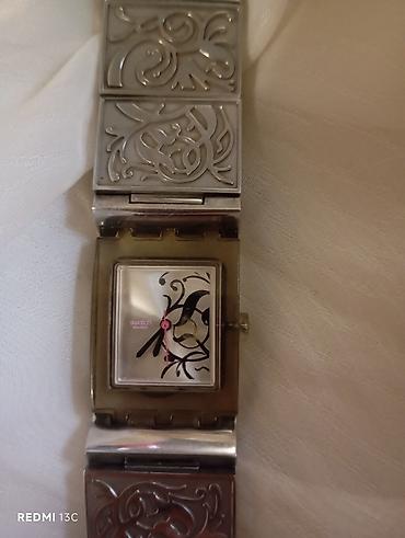 swatch: İşlənmiş, Qol saatı, Swatch, rəng - Gümüşü — 1