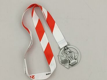 Używany medal pamiątkowy. Idealny stan. Medal z wizerunkiem figury i