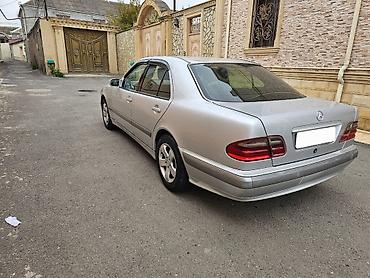 bmw 320 1996: Mercedes-Benz E 220: 2.2 l | 2001 il Sedan — 7
