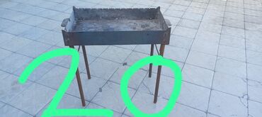 Духовки: Portativ metal manqal, açıq havada istifadə üçün idealdır. Qapaqlı