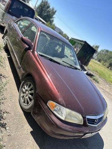 срочно срочно продаю машина: Mazda 626: 2001 г., 2 л, Механика, Бензин, Седан