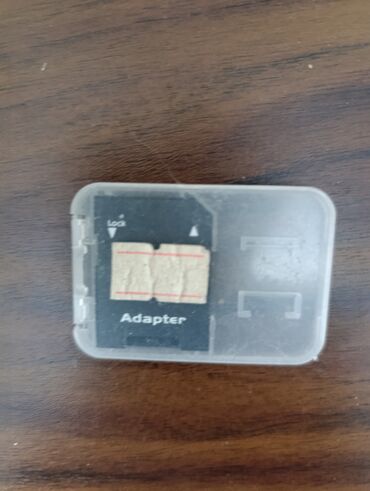 номера симки: Адаптер для карт памяти microSD → SD в пластиковом кейсе. -
