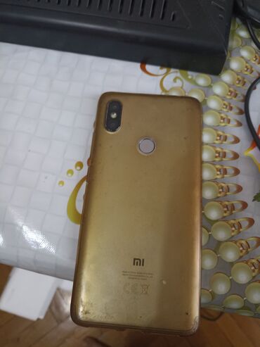 телефон fly с хорошим аккумулятором: Xiaomi Mi A2, 64 ГБ, цвет - Золотой, 
 Отпечаток пальца
