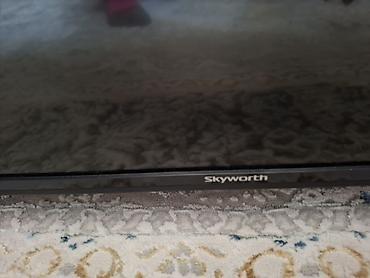ps4 pro kg: Телевизор Skyworth, диагональ примерно 43–50". Тонкие рамки — 1