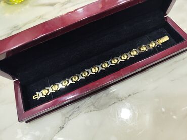 750 prob qizilin lom qiymeti: Italiyanin ORYA Jewelry brendi ag ve sari 750 prob olan qızıl qolbag
