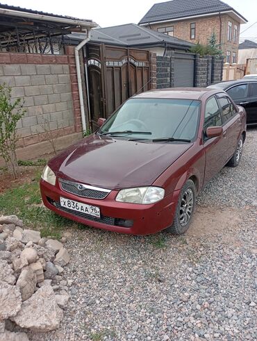 Mazda: Mazda 323: 1998 г., 1.3 л, Автомат, Бензин, Седан