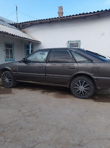 жак бу: Mazda 626: 1991 г., 2 л, Кол менен иштөөчү, Бензин, Хетчбек — 5