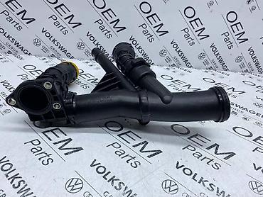 3 103: TERMOSTAT SA RACVOM ZA VOLKSWAGEN TIGUAN, TOURAN, GOLF 7 . - 04L 121 — 4