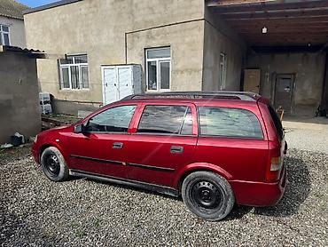 opel astra benzin: Opel Astra Caravan (Universal), qırmızı gövdə yalnız kredetlə — 9