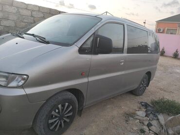 ford 1998: Hyundai H-1 (Grand Starex): 2.5 л | 1998 г. Минивэн