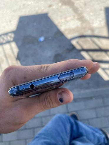 телефон fly fs502 cirrus 1: Xiaomi Mi 9T, цвет - Черный, 
 Отпечаток пальца — 5