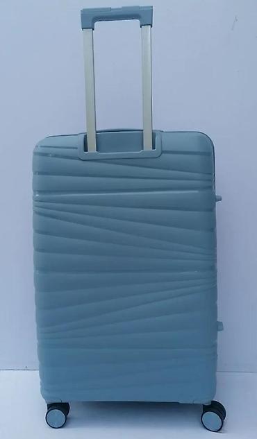Putni koferi i torbe: Tvrdi kofer na točkiće – svetloplava boja - Materijal: čvrsta — 10