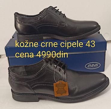 Cipele: Kožne crne cipele – broj 43,Cena: 4990 din (naznačeno na slici). - — 1