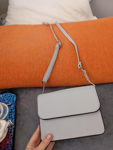 Putni koferi i torbe: Set torbi i tašni – više modela - Elegantna crna tašnica sa metalnim — 28