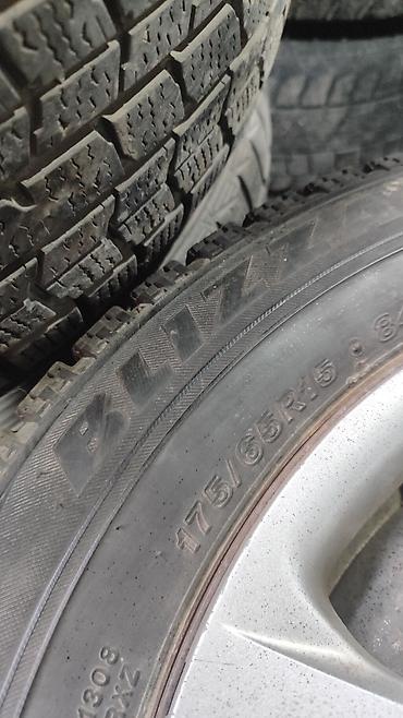 952 2: 175/65r15 с дисками штамповки и колпаки 4*100 фит. Бриджстоун — 3