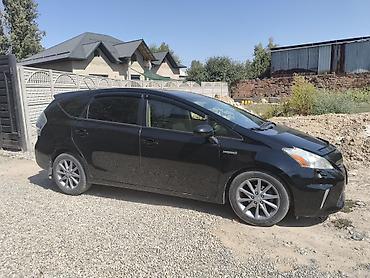 byd e2 2025: Toyota Prius V: 2012 г., 1.8 л, Гибрид, Универсал — 2