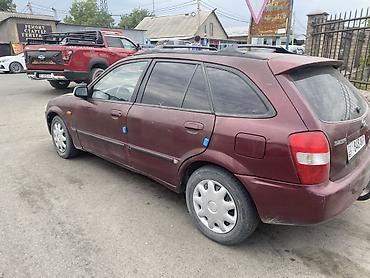 mazda 2000: Mazda 323: 2001 г., 1.6 л, Механика, Бензин, Универсал — 4