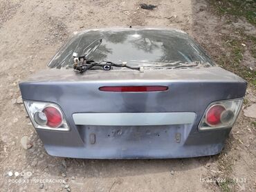 хечбек: Багажник капкагы Mazda 2003 г., Колдонулган, түсү - Күмүш,Оригинал