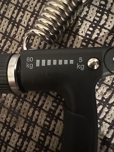 Espanderlər: Tənzimlənən əl gücü trenajoru (hand gripper) - Güc diapazonu: 5 kq – — 1