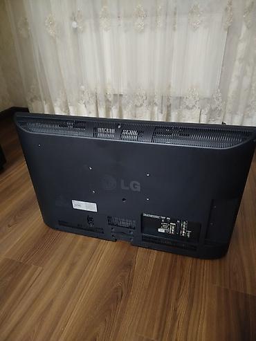 ТВ и видео: LG plazma televizor. Qara rəngli, geniş ekranlı modeldir. Ön hissədə — 2