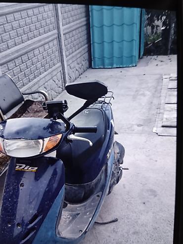 стартеры: Скутер Honda Dio (серия AF), цвет темно-синий. - Двигатель — 2